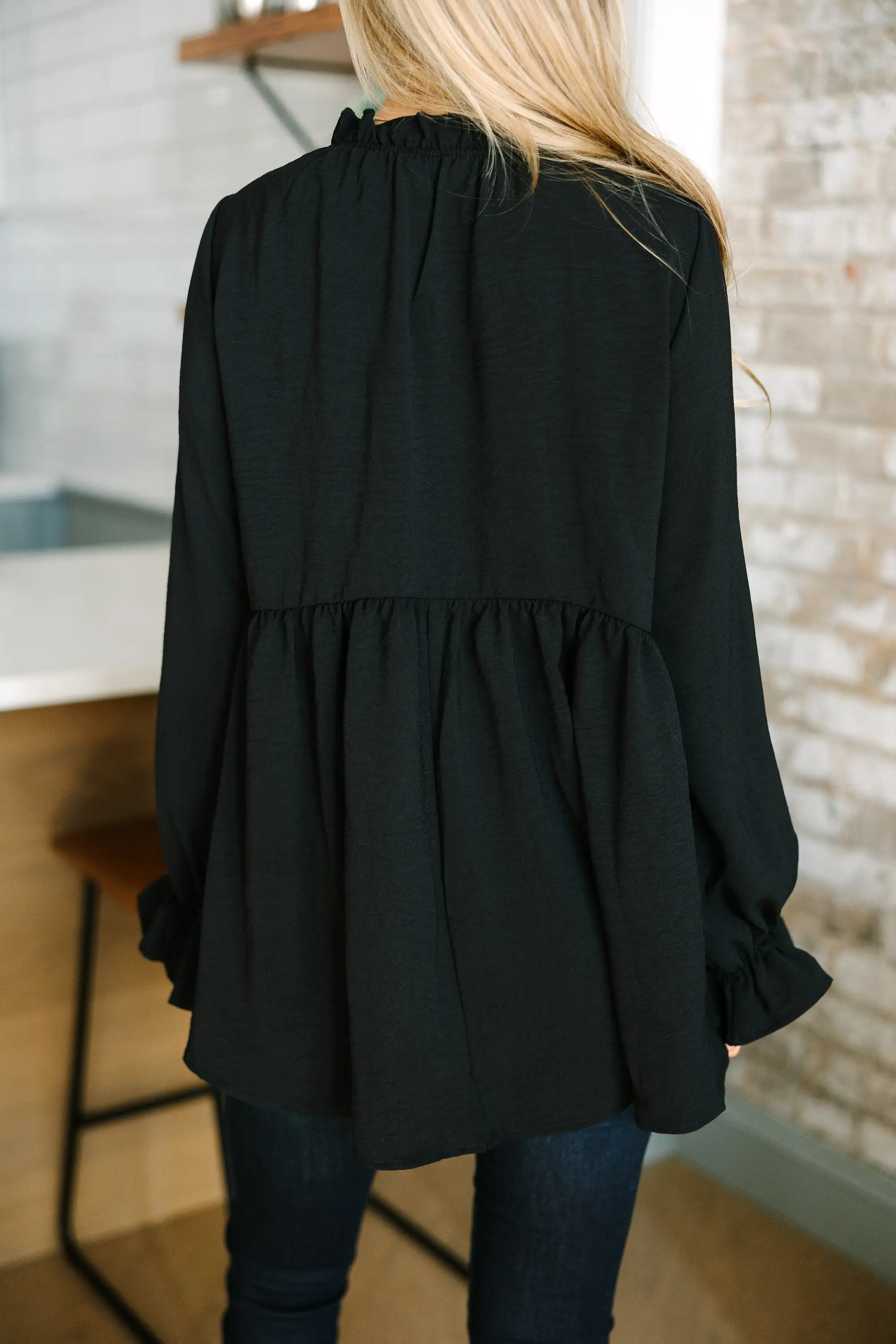 Making Moves Black Ruffled Blouse